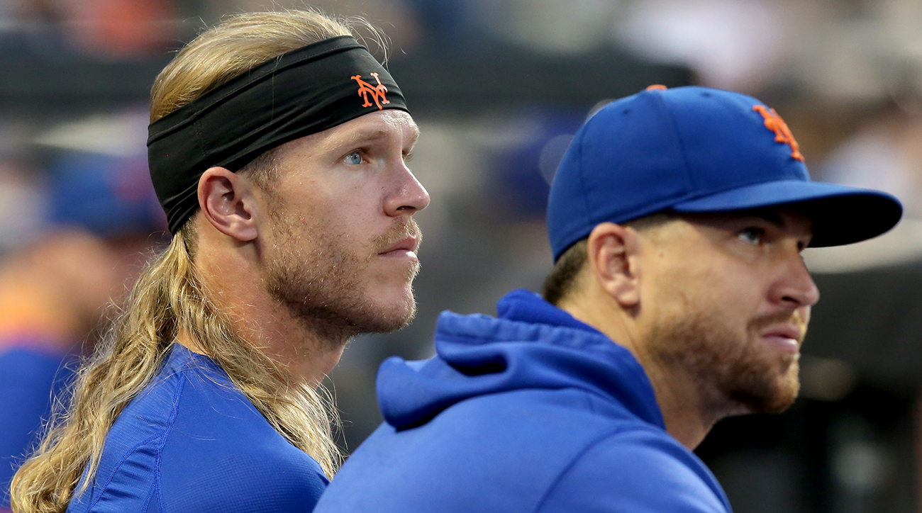 Noah Syndergaard (left) and Jacob deGrom (right) with the Mets.